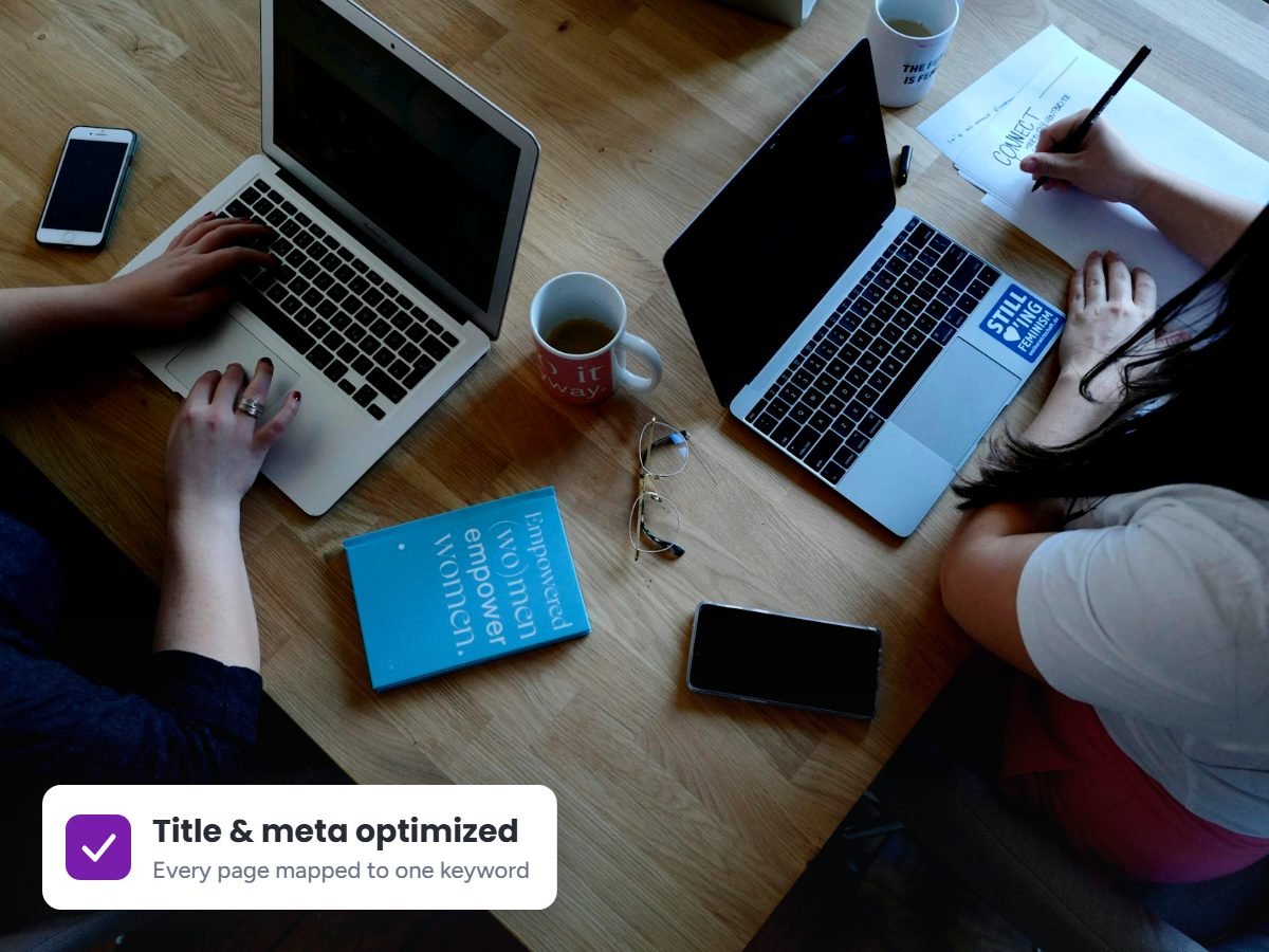 Marketing team optimizing website pages for on-page SEO at a shared desk