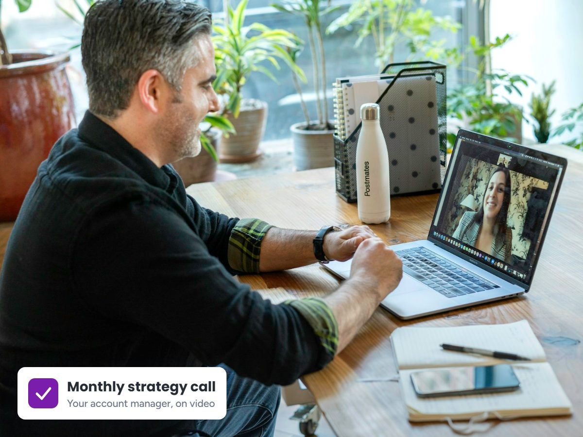 Business owner on a video call with his SEO account manager