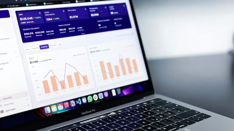 Traffic report on a laptop next to an SEO audit checklist for small businesses