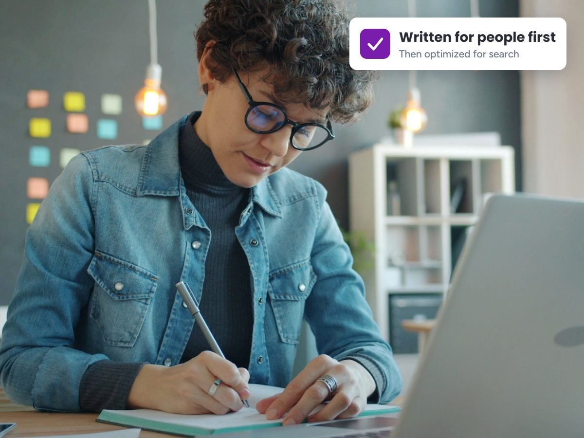 SEO content writer drafting a blog post at a laptop
